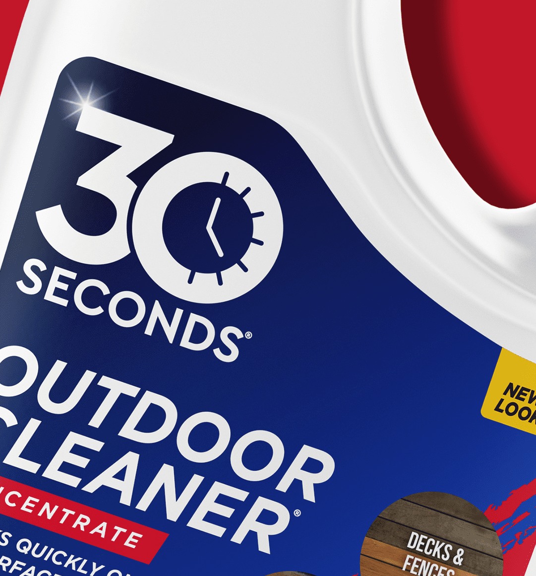 Close-up of a blue product label reading '30 SECONDS OUTDOOR CLEANER' with a clock icon, indicating a concentrate.