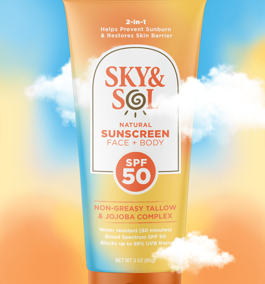 Sunscreen bottle labeled Sky & Sol SPF 50, orange gradient with white label and clouds in the background, for face and body use